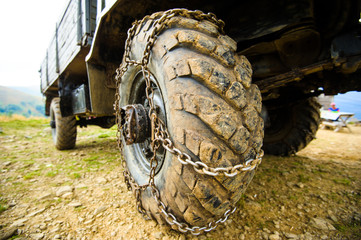 Fototapeta na wymiar wheel of the car in the mud