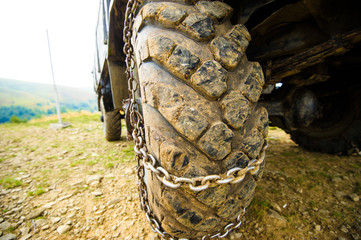 Fototapeta na wymiar wheel of the car in the mud