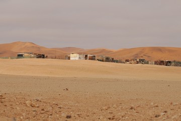Fototapeta na wymiar Topnaar-Siedlung in der Namib (bei Rooibank)