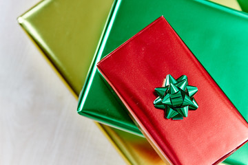 Top view showing luxury presents on wooden background