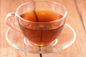 A cup of tea on wooden background