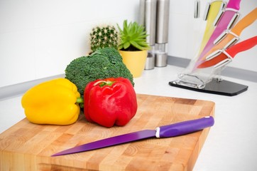 Fresh vegetables on a chopping board in the kitchen