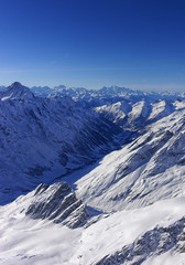 Valley in Jungfrau region helicopter view in winter