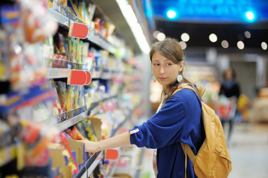 Young woman at supermarket