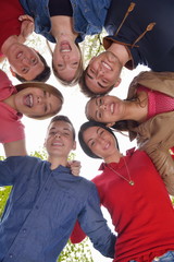 Fototapeta premium young friends staying together outdoor in the park