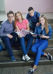 Obraz premium happy teens group in school