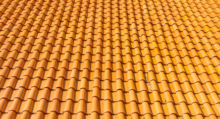 Red tiles roof background