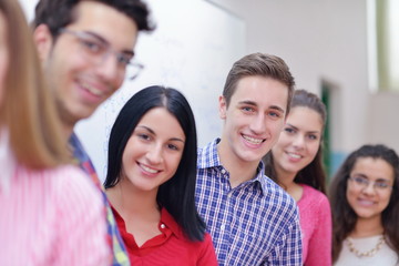 happy teens group in school