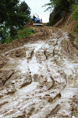 road wet muddy of backcountry countryside