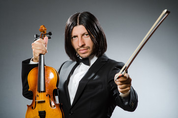 Man violin player in musican concept