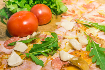 pizza with arugula and mushrooms