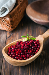 cranberries in a wooden spoon
