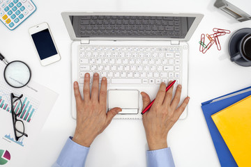 Woman using computer in the office