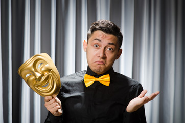 Funny concept with theatrical mask