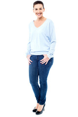 Fototapeta premium Smiling female model in trendy casuals