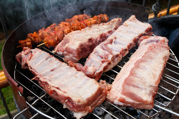 Charcoal barbecue ribs and kebabs