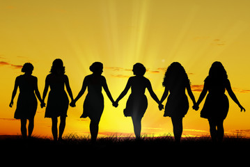 Women walking hand in hand - 71813129