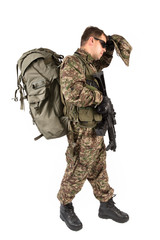 Soldier with rifle on a white background