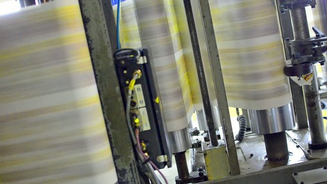 Newspaper coming fast of the printing machine