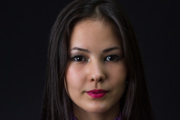 Obraz premium thoughtful young asian girl