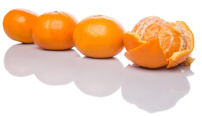 A group of Mandarin orange fruit over white background