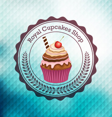 Cupcake with label over polygonal background