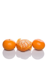 A group of Mandarin orange fruit over white background