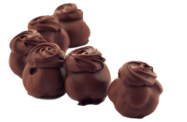 chocolate candies against white background