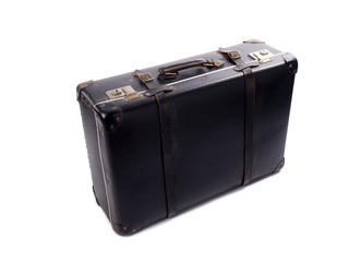 An old black vintage leather suitcase with straps