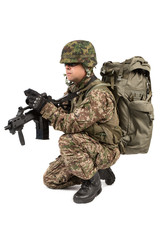 Soldier with rifle on a white background