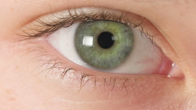 female teen eye close up, open and blinking