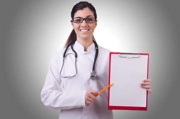 Woman doctor isolated on the white