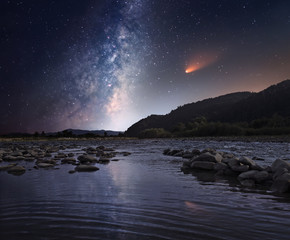 Fototapeta na wymiar Comet over the night river