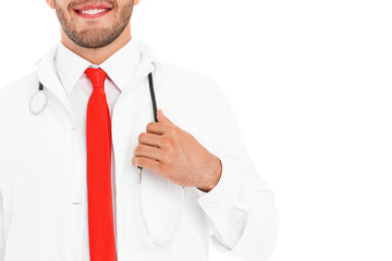 Midsection of a doctor holding stethoscope