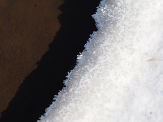 Obraz na płótnie Canvas snow and sand