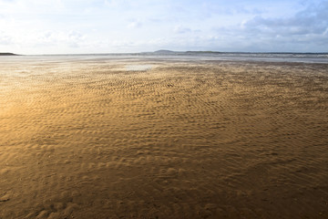 golden ripples of sand