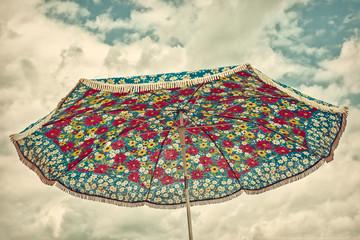Retro styled image of an old parasol © Martin Bergsma