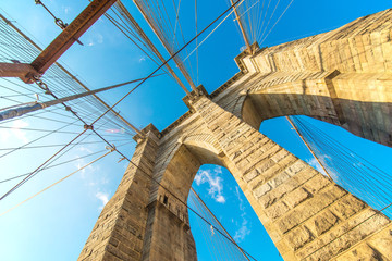 Part of famous Brooklyn bridge on bright day