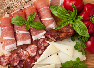 Variety of meat products and vegetables