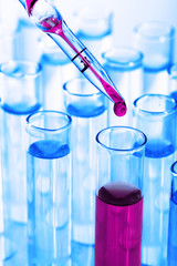 Test tubes on blue background