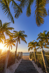 Passage to the beach at sunrise