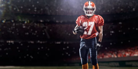 Foto op Aluminium American football player in action on the stadium © 103tnn