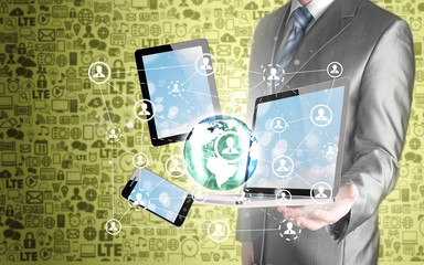 Business man using tablet PC and smartphone social connection