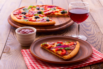  Pizza with tomato, salami and olives