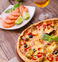 Pizza with seafood.