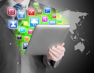 Business man use tablet pc with colorful application icons