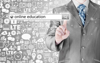 Online education written in search bar on virtual screen.