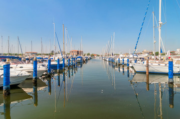 Port of Cervia with boats and yachts on the quay, Italy. - 71837367