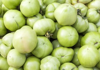 Pickle green tomatoes in a supermarket