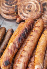 Sausages grilled on a barbecue